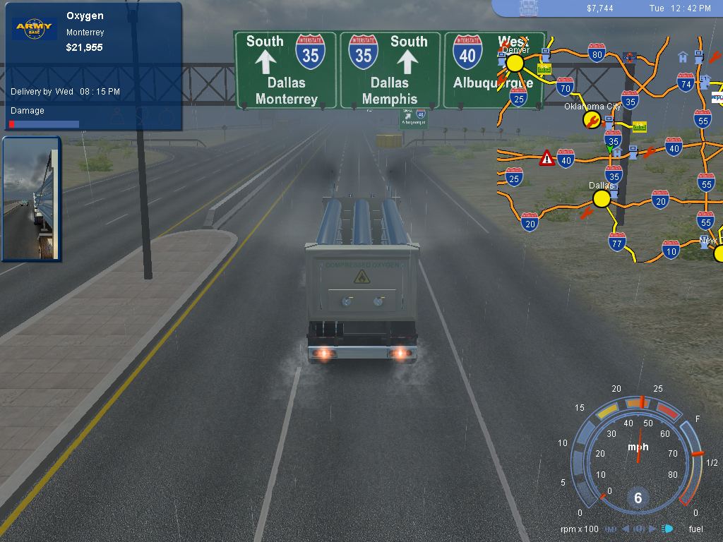 Drive through a rain-soaked highway in 18 Wheels of Steel Pedal to the Metal (2004) Microsoft Windows PC CD.