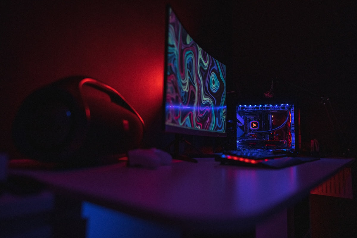 black and red gaming mouse on black mouse pad