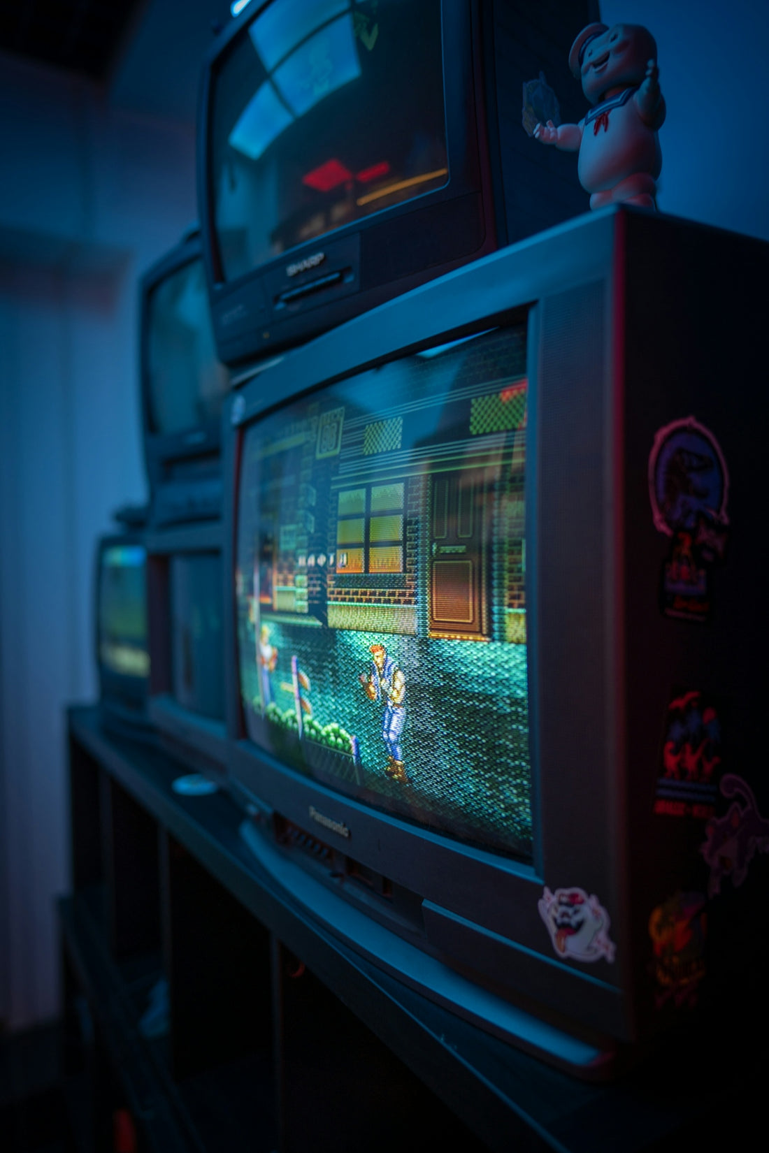 black crt tv turned on in a room