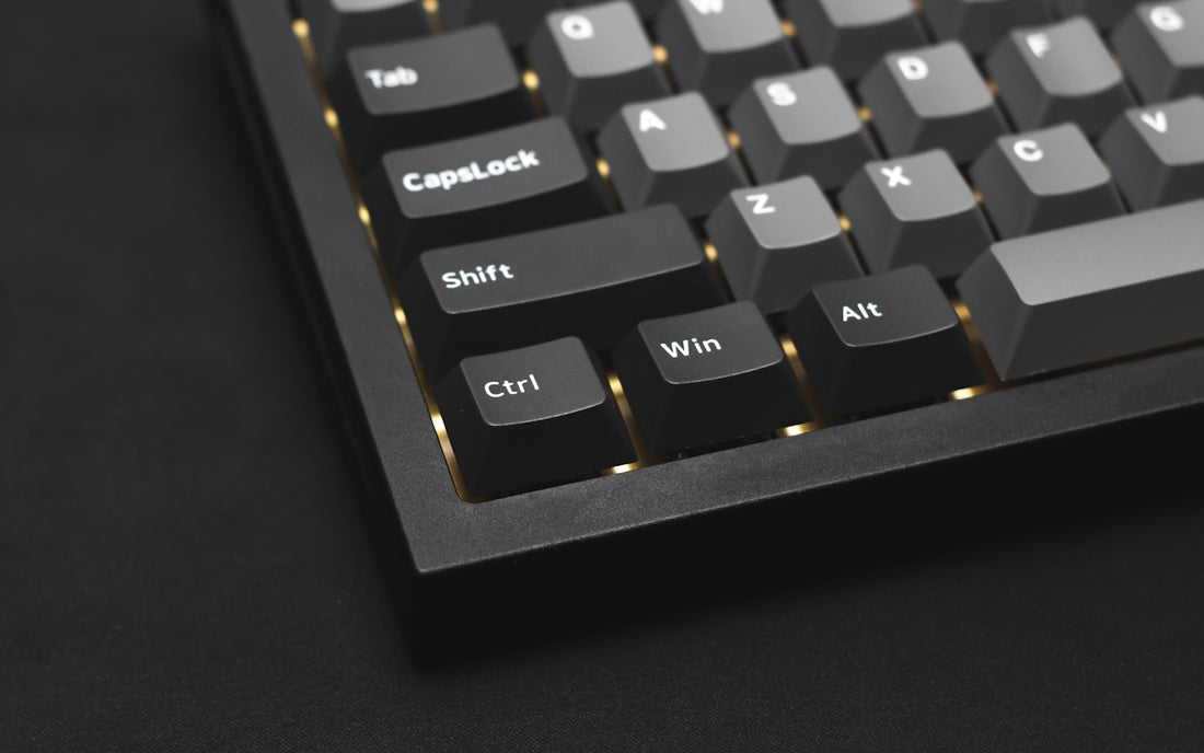 a close up of a computer keyboard on a table