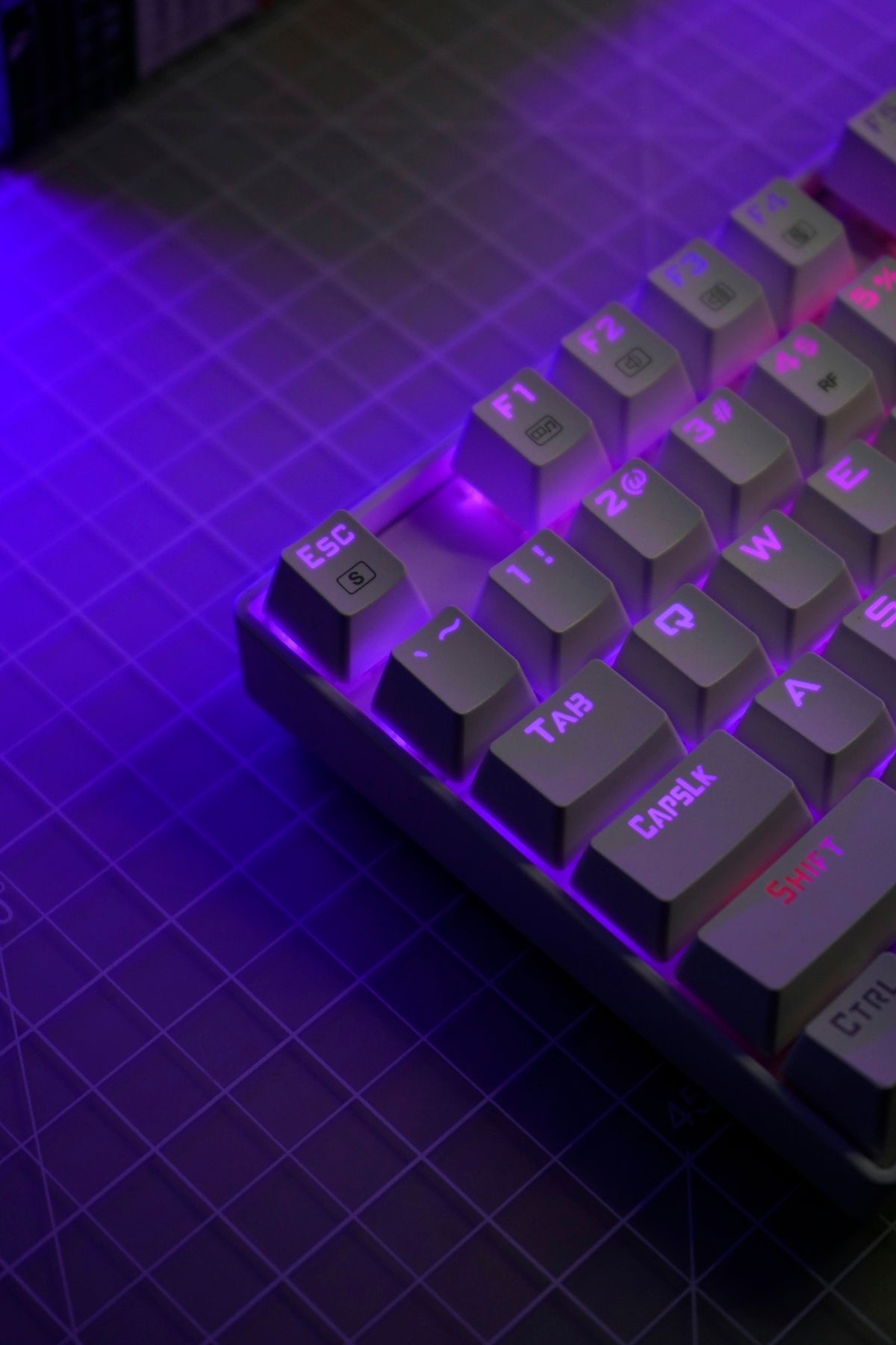a computer keyboard sitting on top of a table