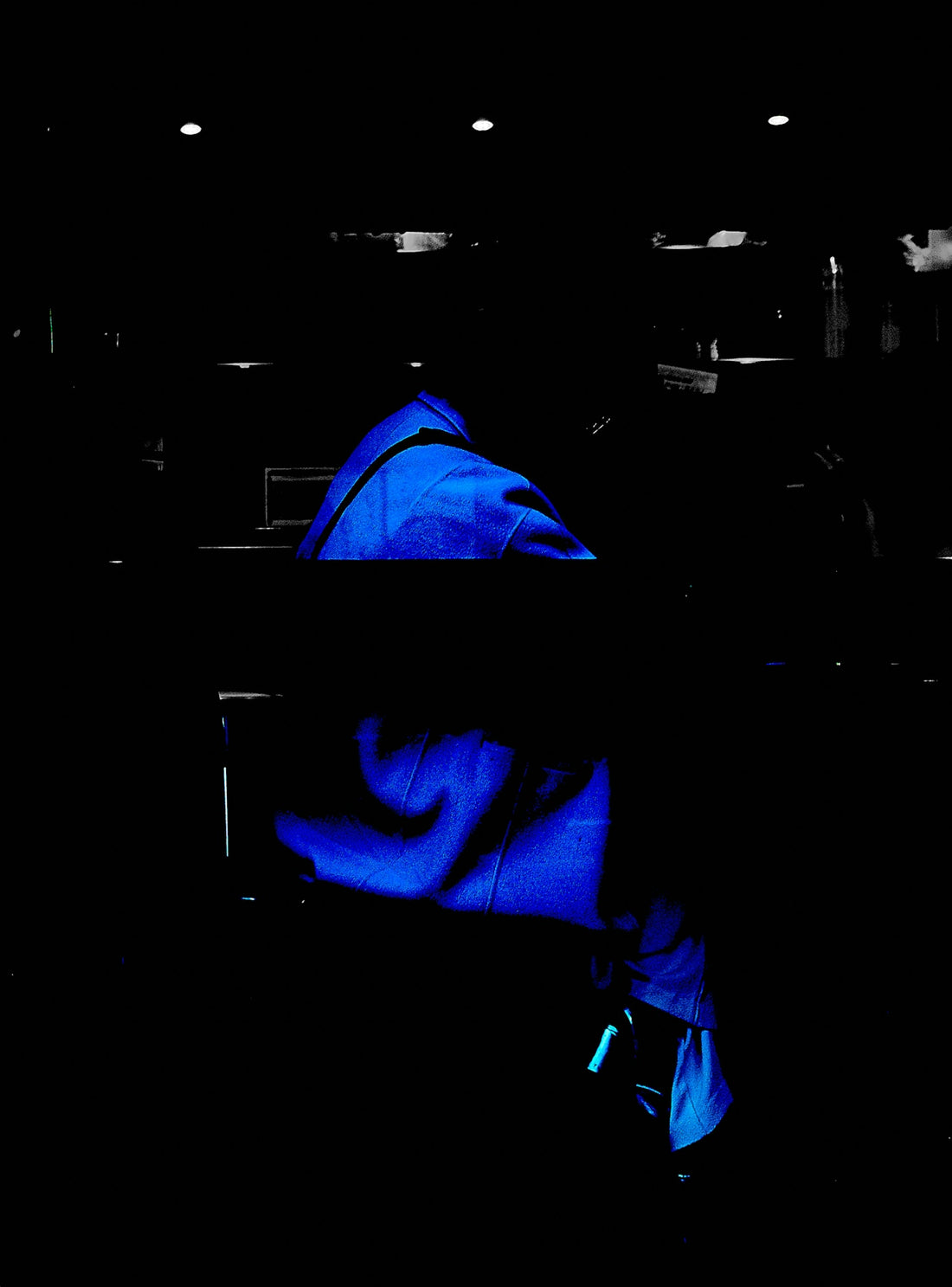 a person is sleeping in a dark room