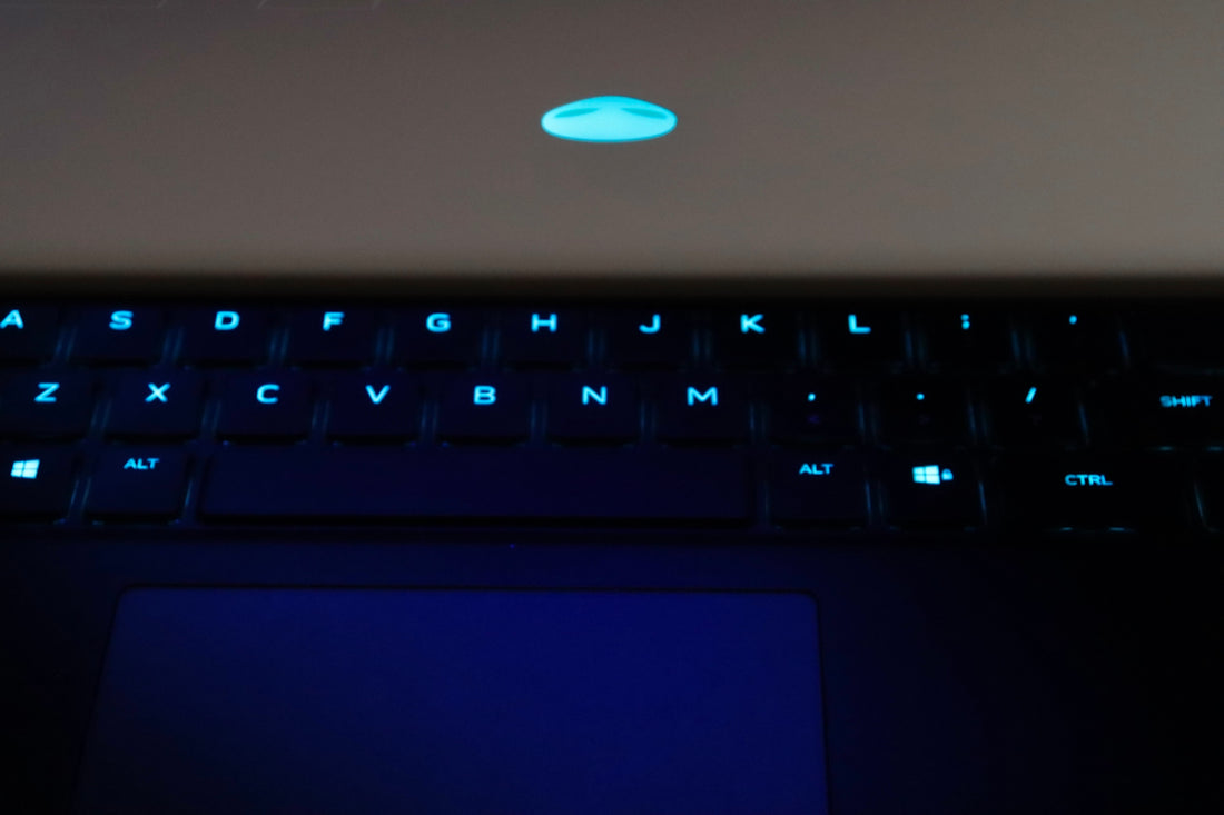 a close up of a laptop computer keyboard
