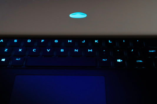 a close up of a laptop computer keyboard