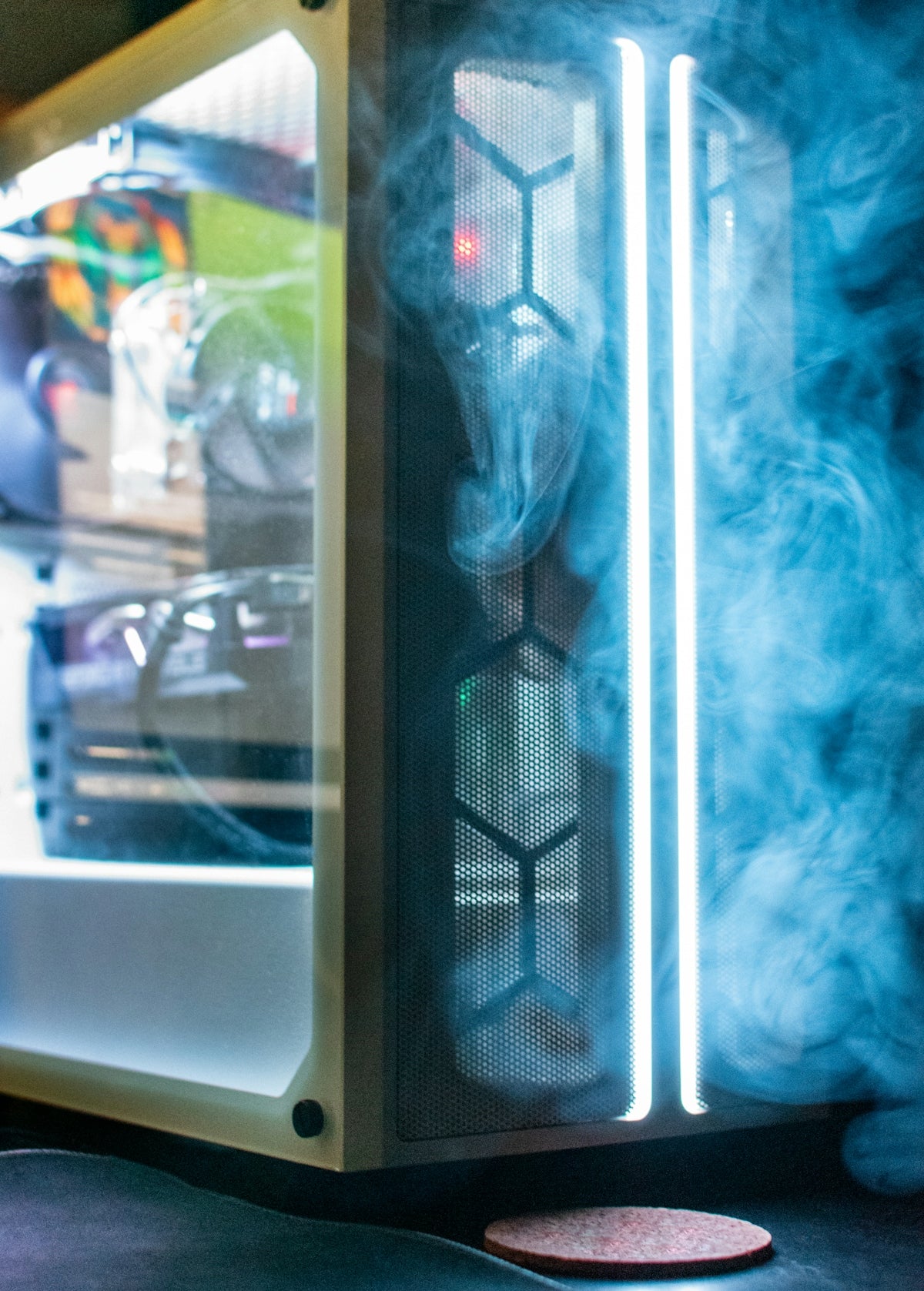 a computer case with smoke coming out of it