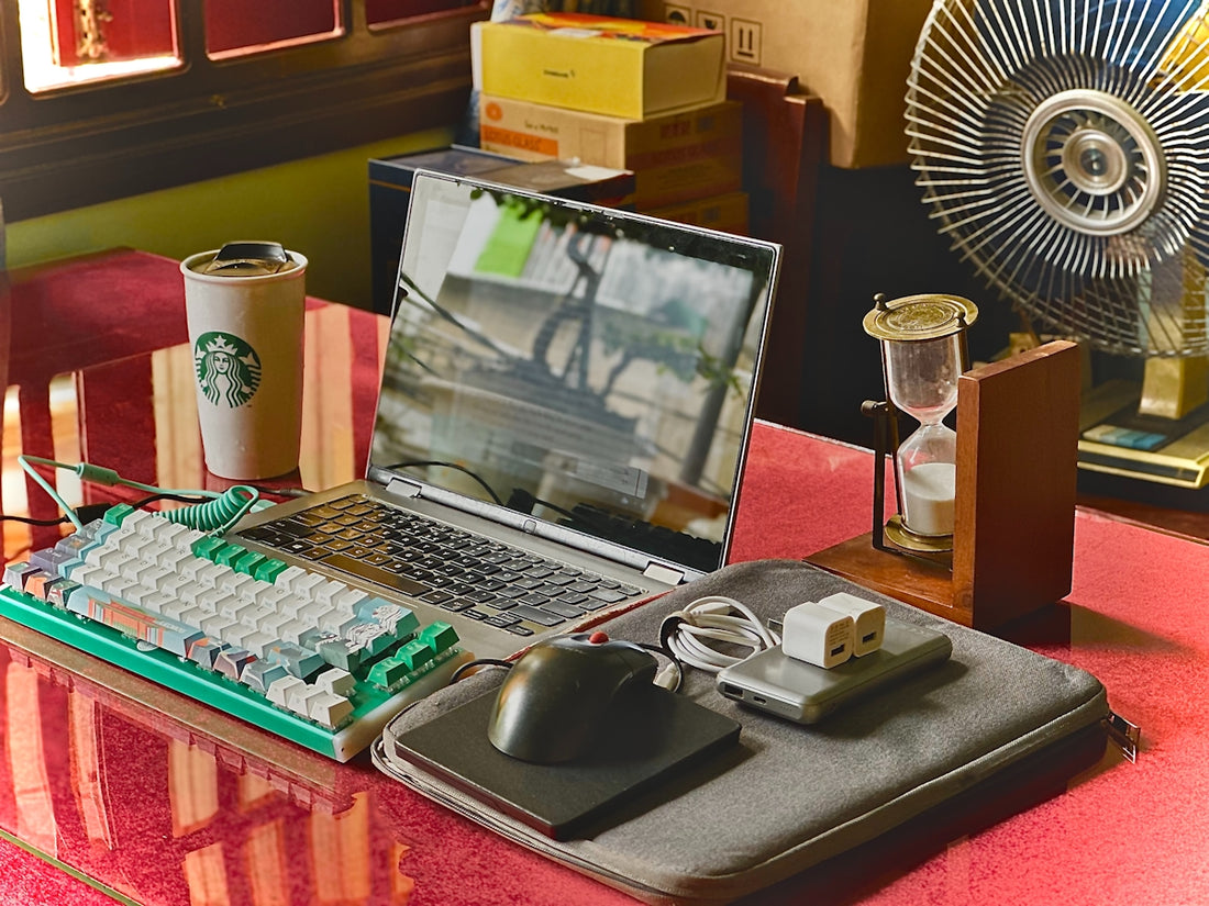 A laptop computer sitting on top of a desk