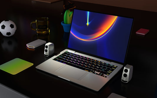 a laptop computer sitting on top of a desk