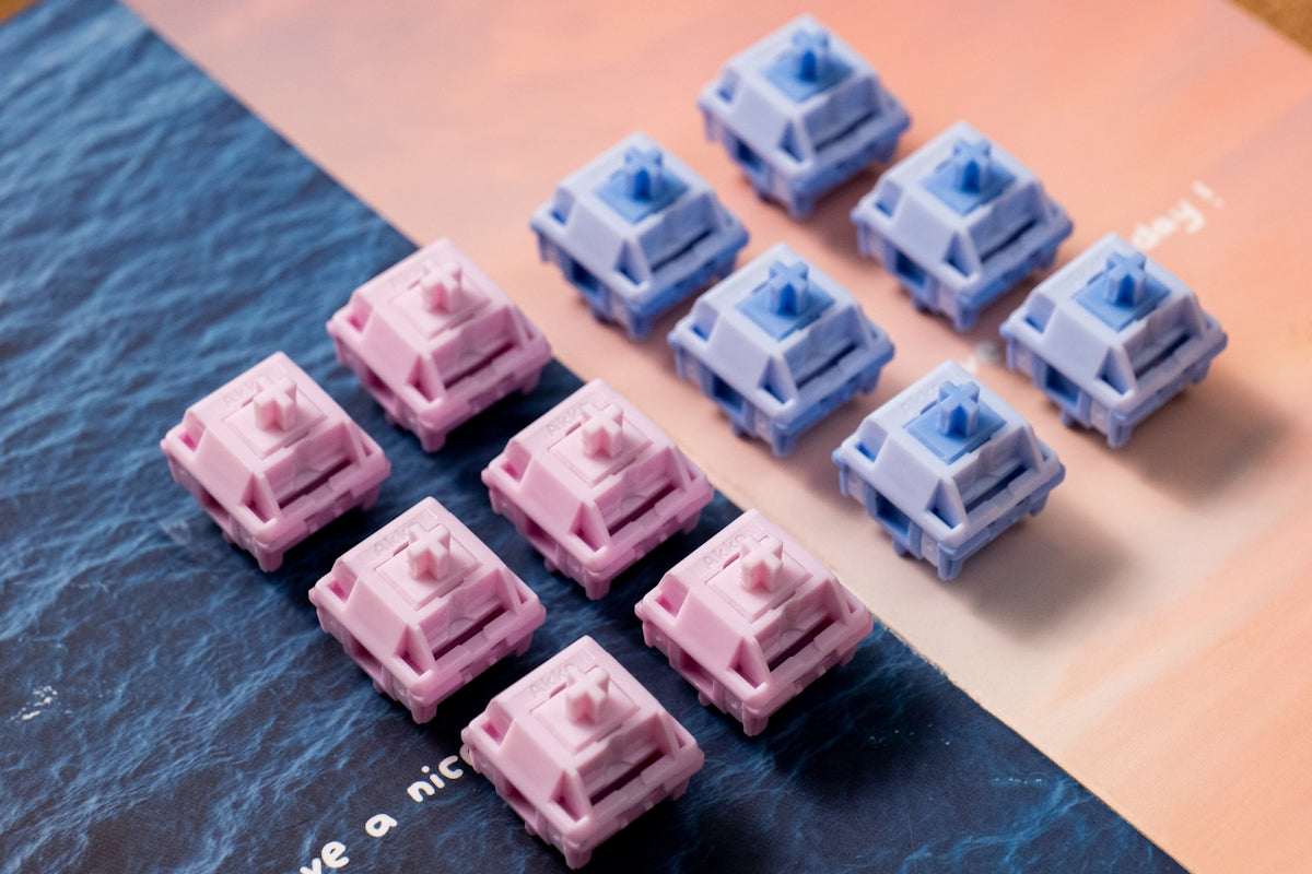A group of small blue and pink objects on a table