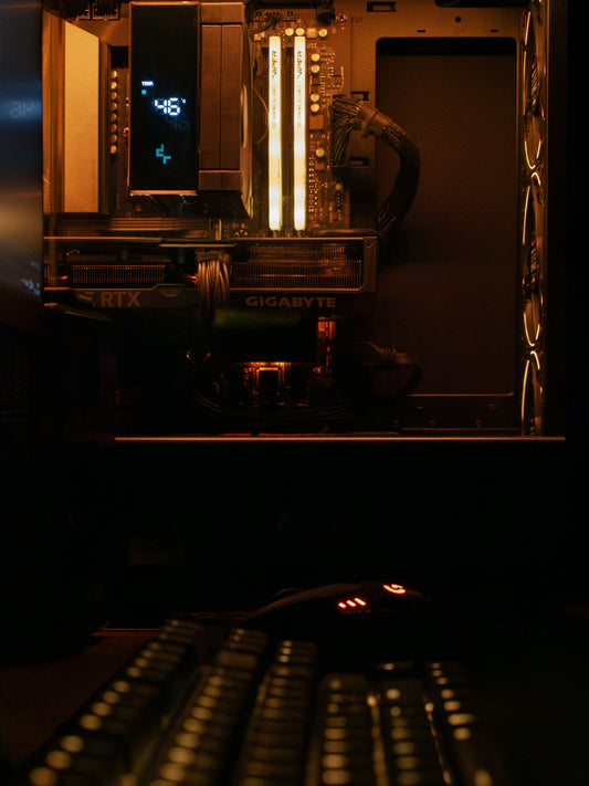 A computer monitor sitting on top of a desk