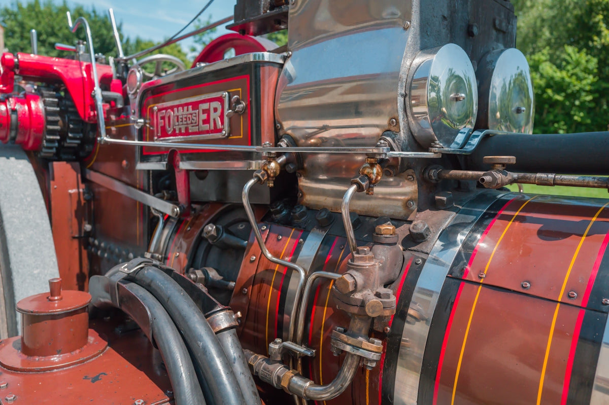 Close-up of a vintage steam engine's mechanical parts