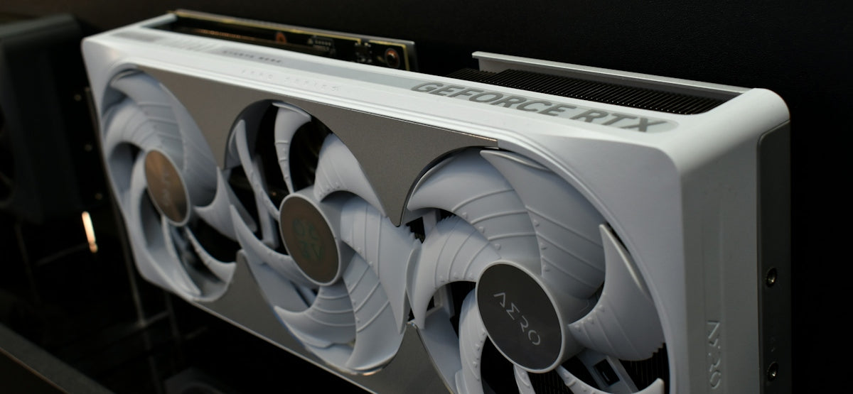White graphics card with three fans and rtx logo