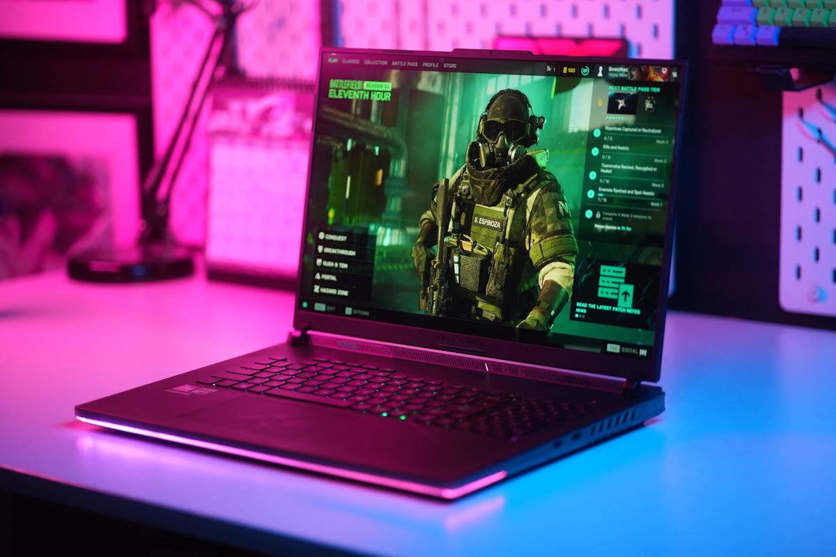 Gaming laptop displaying a first-person shooter game.